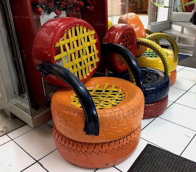 chairs made from tires in Quito store window