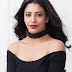 Beautiful Tamil Girl Daksha Nagarkar Long Hair Stills In Mini Black Dress