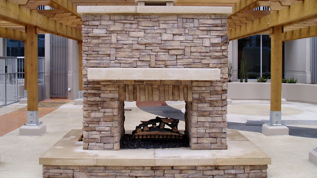 interesting-see-through-outdoor-fireplace