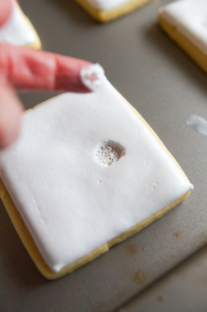 Why won't my royal icing dry? Why is it tacky? Sticky? Bubbly?