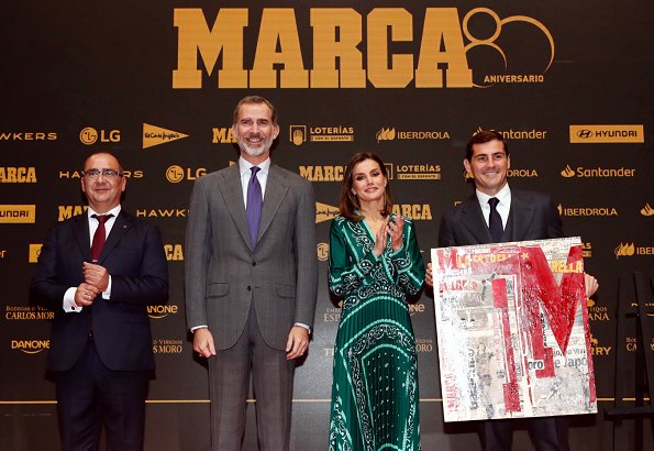Queen Letizia wore a new scarf-print long dress by Sandro, with Prada pumps for Marca's lunch at Royal Theatre