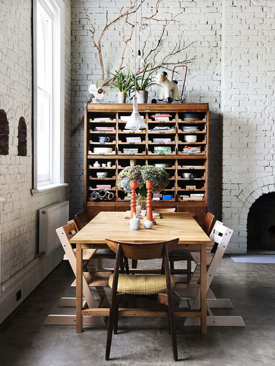 White painted brick walls and vintage cabinetry. Photo by Eve Wilson via The Design Files.