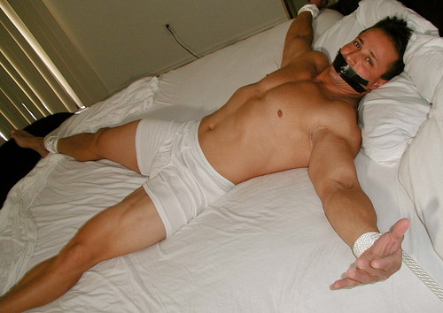 Man tied spread eagle — img 11