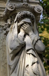 Grieving statue