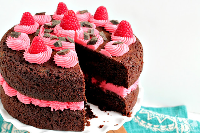 With its rich & chocolaty cake layers frosted with a fresh raspberry buttercream, you certainly cannot go wrong with this crowd-pleasing Chocolate Raspberry Layer Cake for your next party or celebration.