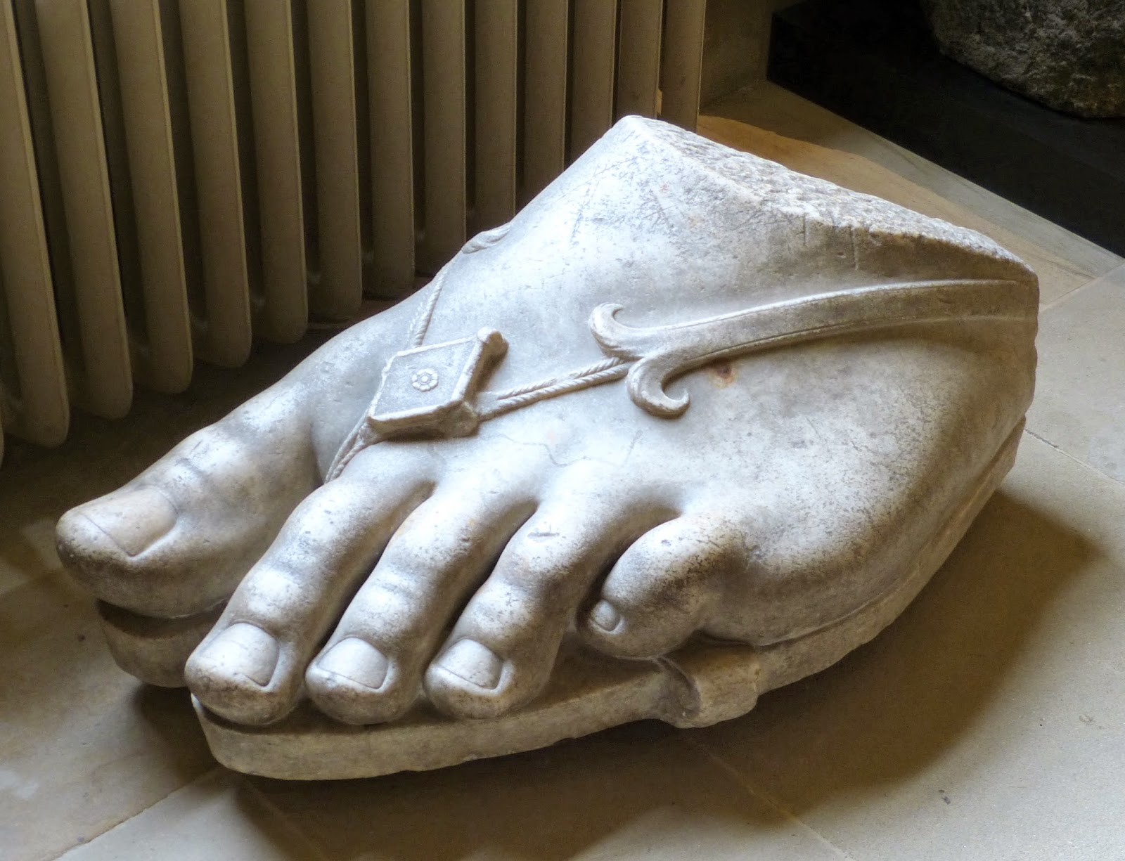 A gigantic foot from a 1st century Greek statue on display in the Chapel Corridor, Chatsworth