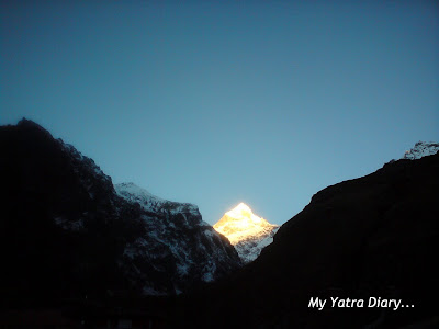The majestic sight of the Neelkanth peak in the Garhwal Himalayas, 

Badrinath during sunrise