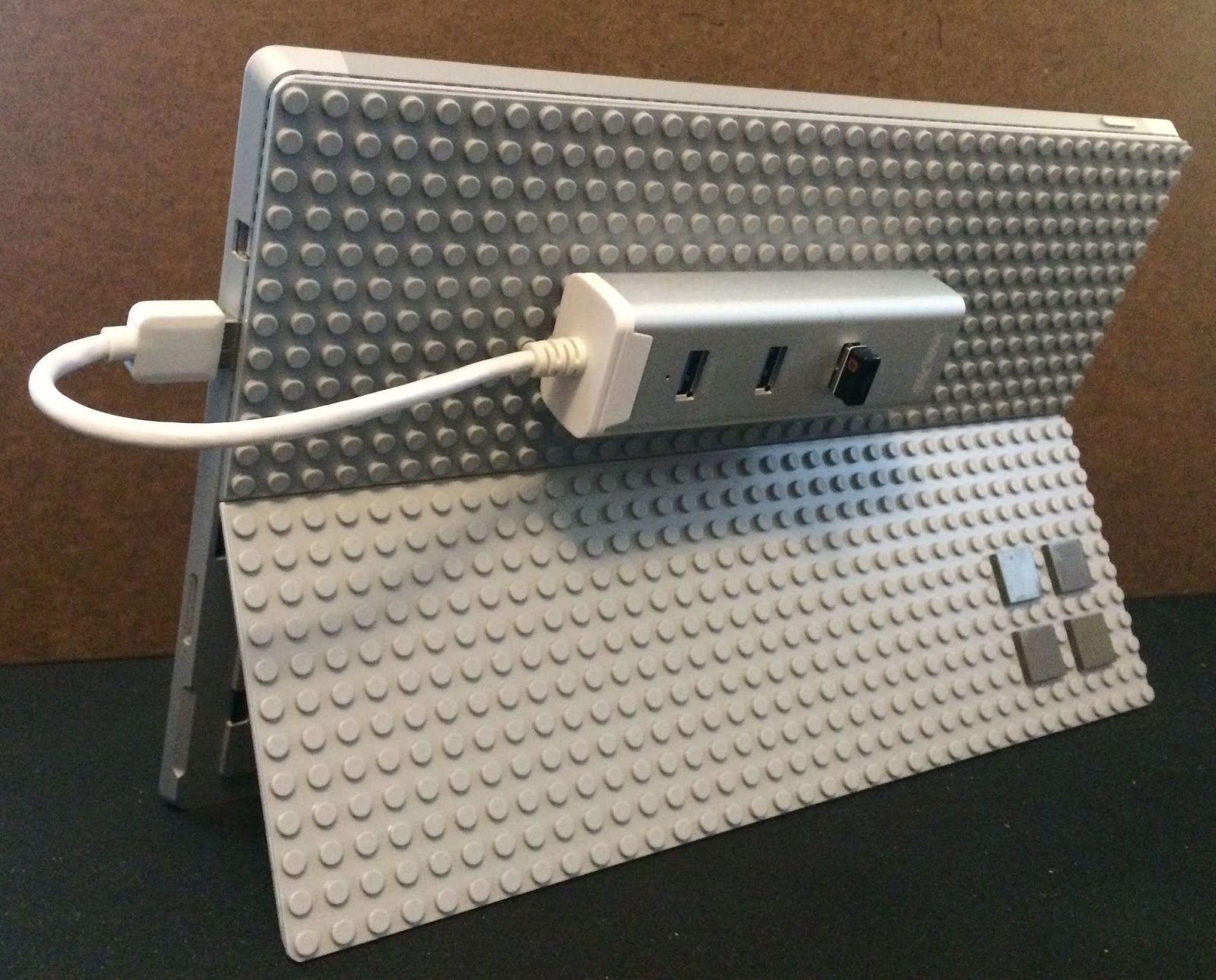 #15. It's also totally customizable, and you can swap out the accessories you'd use in the back. Pretty cool, huh?- He Glued LEGO To His Tablet. The Reason Why… I Can’t Wait To Try. #15. It's also totally customizable, and you can swap out the accessories you'd use in the back. Pretty cool, huh?- He Glued LEGO To His Tablet. The Reason Why… I Can’t Wait To Try.