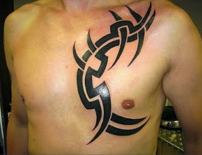 Very simple tattoo on the chest. This tribal tattoo is one of the best tattoo designs for men in the chest