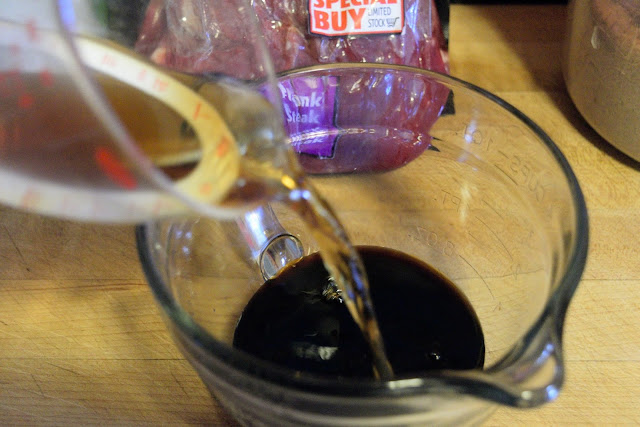 Marsala wine being added to the mixing bowl.