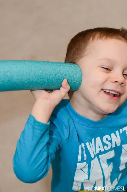 How to use a pool noodle to work on volume control with kids - great idea for kids with autism from And Next Comes L