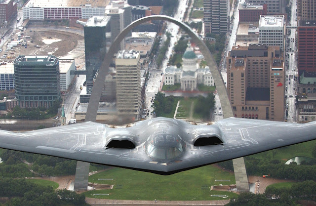 B-2 Spirit flying over the St. Louis Arch.
