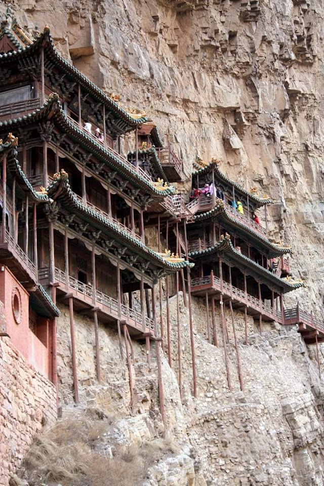 Wanna visit? China's ancient temple hanging over cliffside to reopen after rock damage.