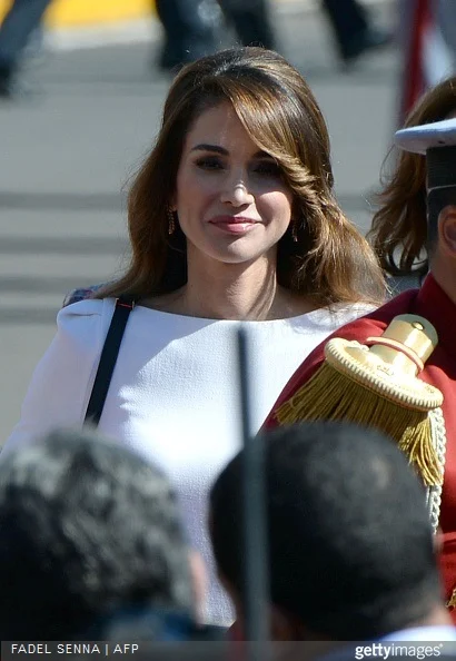 Jordan's Queen Rania attends a welcome ceremony with her husband King Abdullah II at the Royal Palace in the Moroccan city of Casablanca