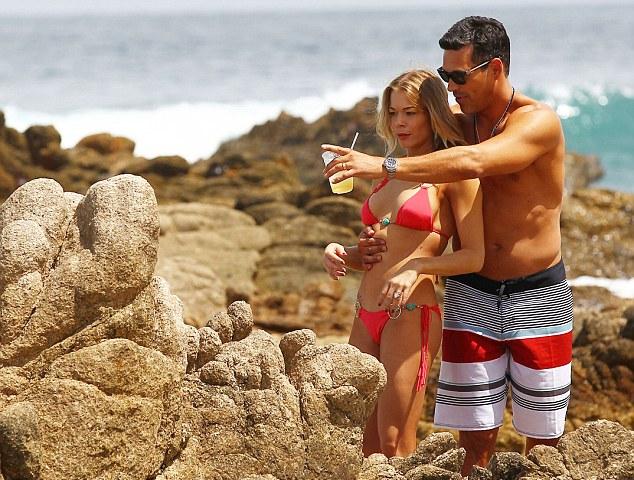 LeAnn Rimes shows off her ripped figure in a two-piece Bikini