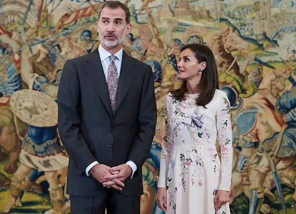 Queen Letizia wore Asos Design Tall midi dress with pretty floral and bird embroidery, and Magrit pink pumps and Magrit pink bag