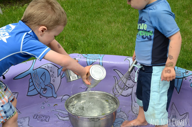 Kids playing in a musical science pool activity together