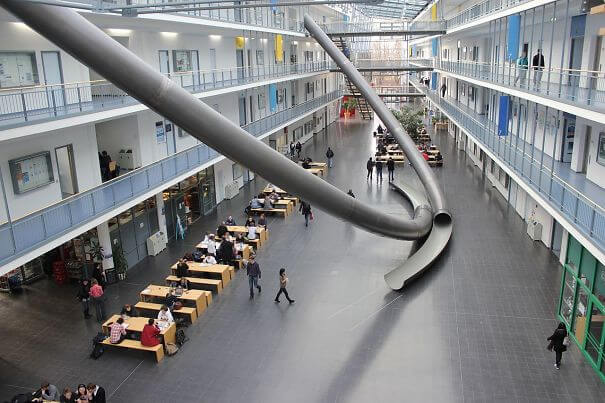 30 Extremely Intelligent School & University Ideas That Will Make You Jealous - Technical University Munich Put Slides In Their Building. I'm Pretty Jealous