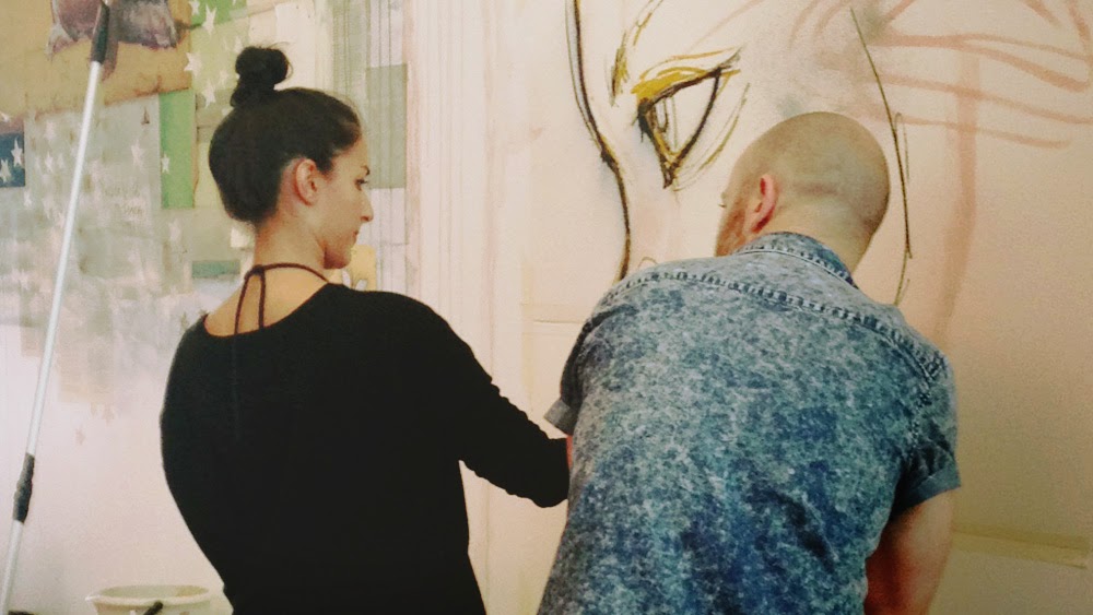 The painters begin their work. Photograph by Rainy Martini.