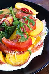 Midsummer Yellow Peach and Heirloom Tomato Salad on a Bed of Whipped Goat Cheese