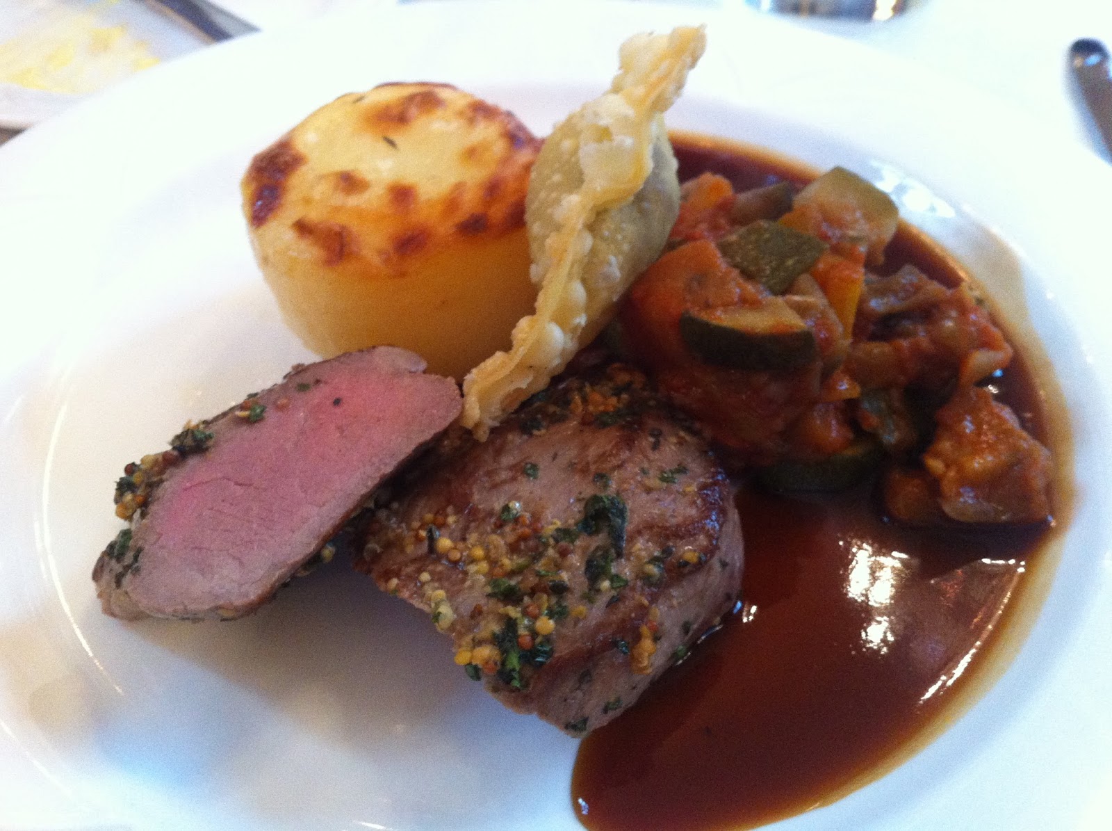 behind the frying pan Lamb fillet,lamb shoulder samosa,fondant potato