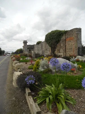 Old stone structure and garden near Ringsend in Dublin after completing the Poolbeg Lighthouse Walk