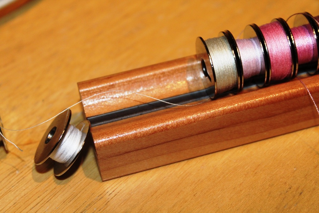 Sewing Patterns, Tips & Tutorials by Gaila Designs Bobbin Holder...do we see a trend