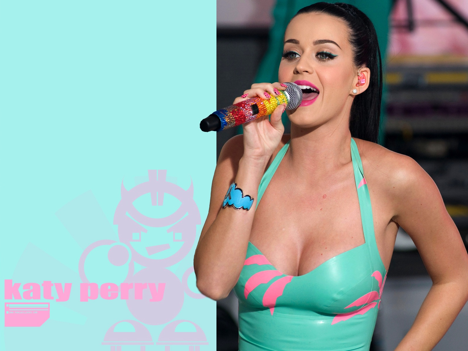 Katy Perry is wearing a hot sexy blue dress.