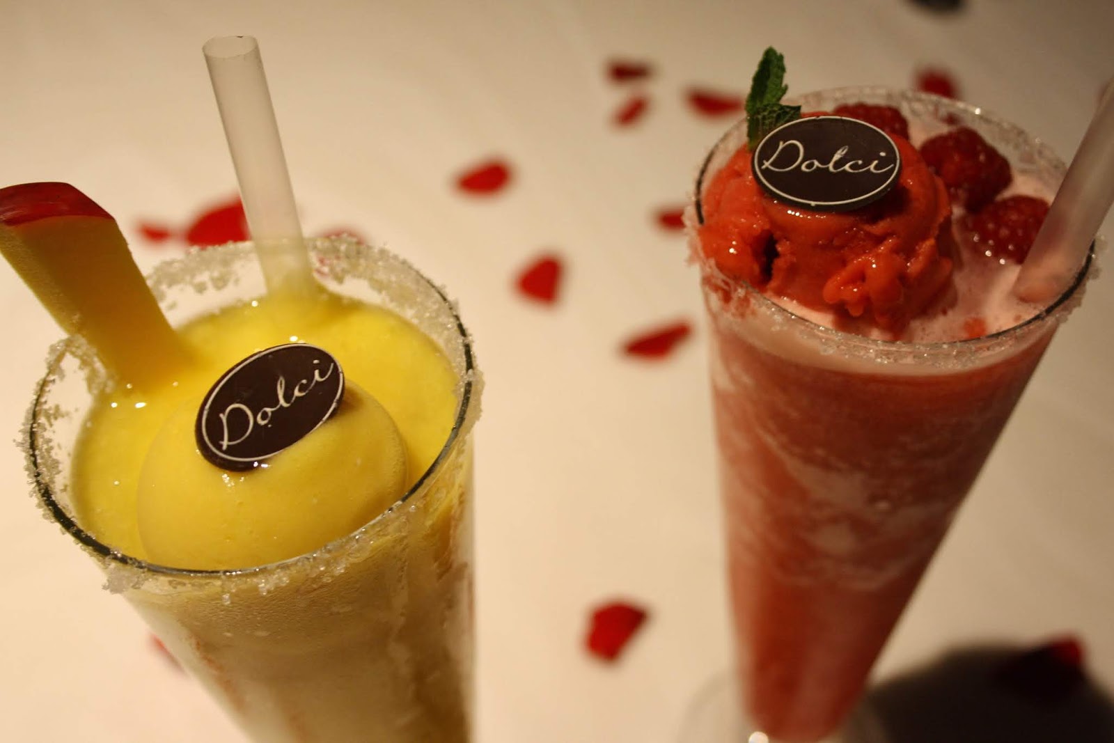 two haute dolci mocktails at the Leicester restaurant, one yellow, one red