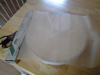 Cover the dehydrator tray with parchment paper.