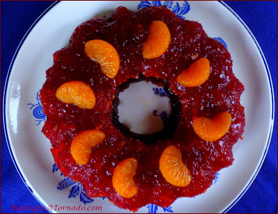 Cranberry Holiday Jello, a jello based holiday treat that includes cranberry sauce, fruits and nuts | Recipe developed by www.BakingInATornado.com | #recipe #Thanksgiving