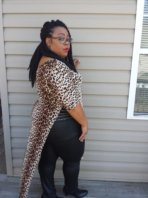 Plus size leopard-print maxi tee with faux leather leggings and black booties