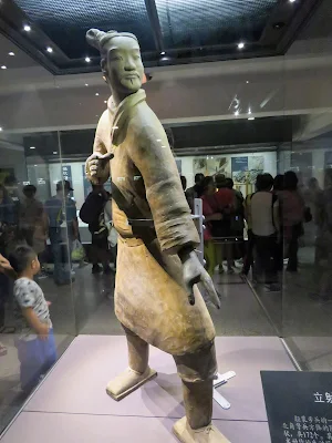 Terracotta Warrior behind glass in Pit 2 of the Terracotta Army near Xi'an China