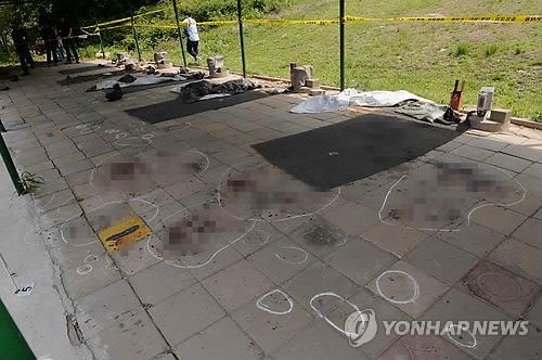 Marcas forenses en el campo de tiro donde un soldado coreano mató a dos compañeros