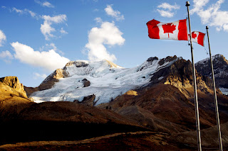 Waving Canadian Flags and Mountain Landscape HD Wallpaper