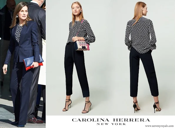 Queen Letizia wore a Carolina Herrera navy ecru polka dot silk top