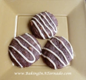 Chocolate PB Chip Cookies with Peanut Butter Drizzle | www.BakingInATornado.com | #recipe