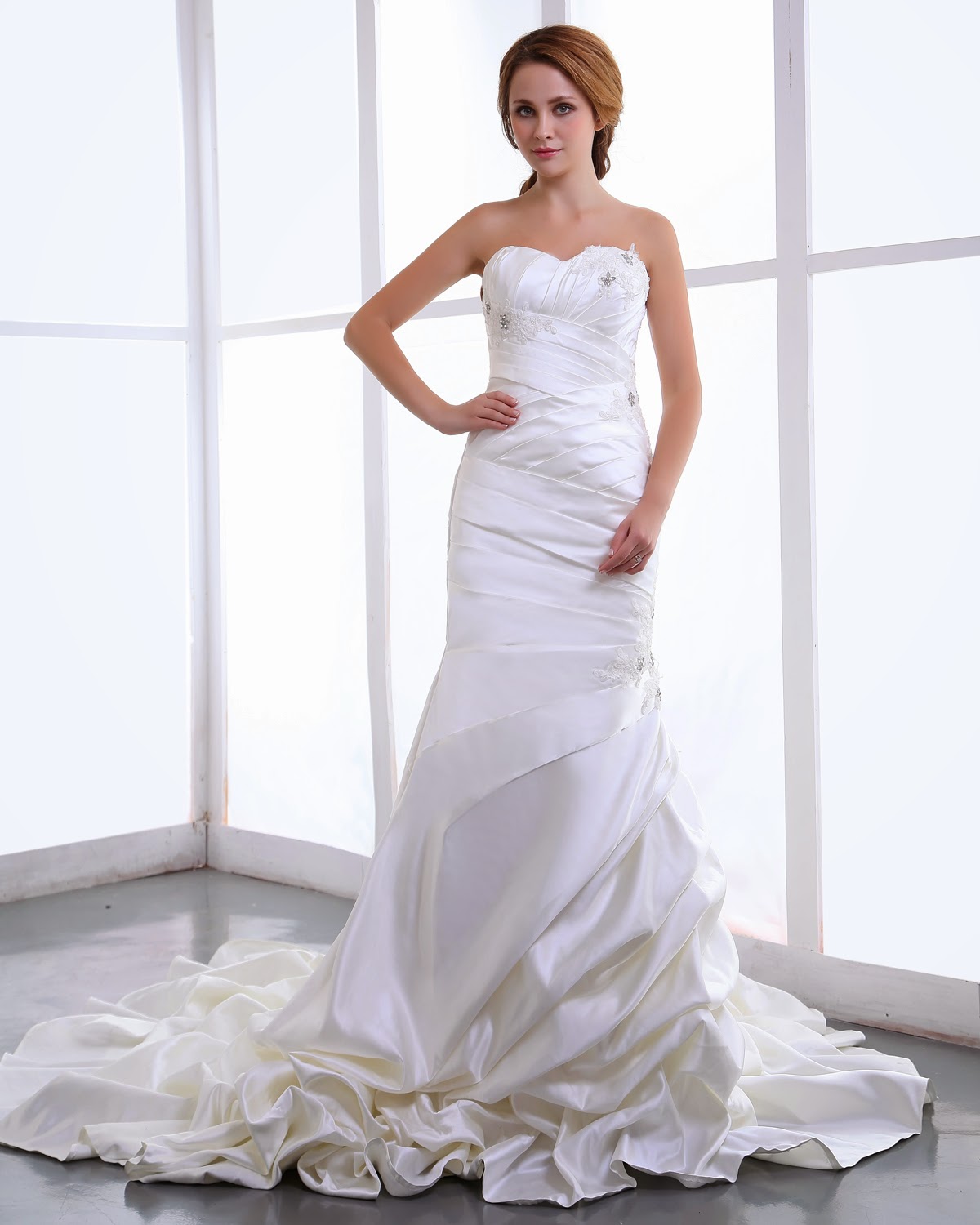 http://www.victoriasdress.co.uk/2014-new-style-trumpet-mermaid-sweetheart-sleeveless-satin-white-wedding-dress-with-ruffles-bukch148.html
