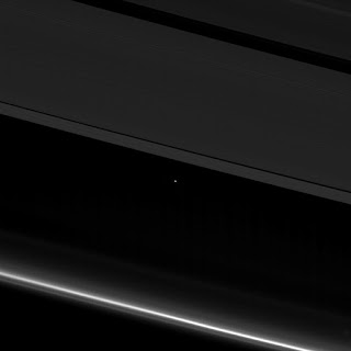 Earth and the Moon seen between the Rings of Saturn by Cassini spacecraft