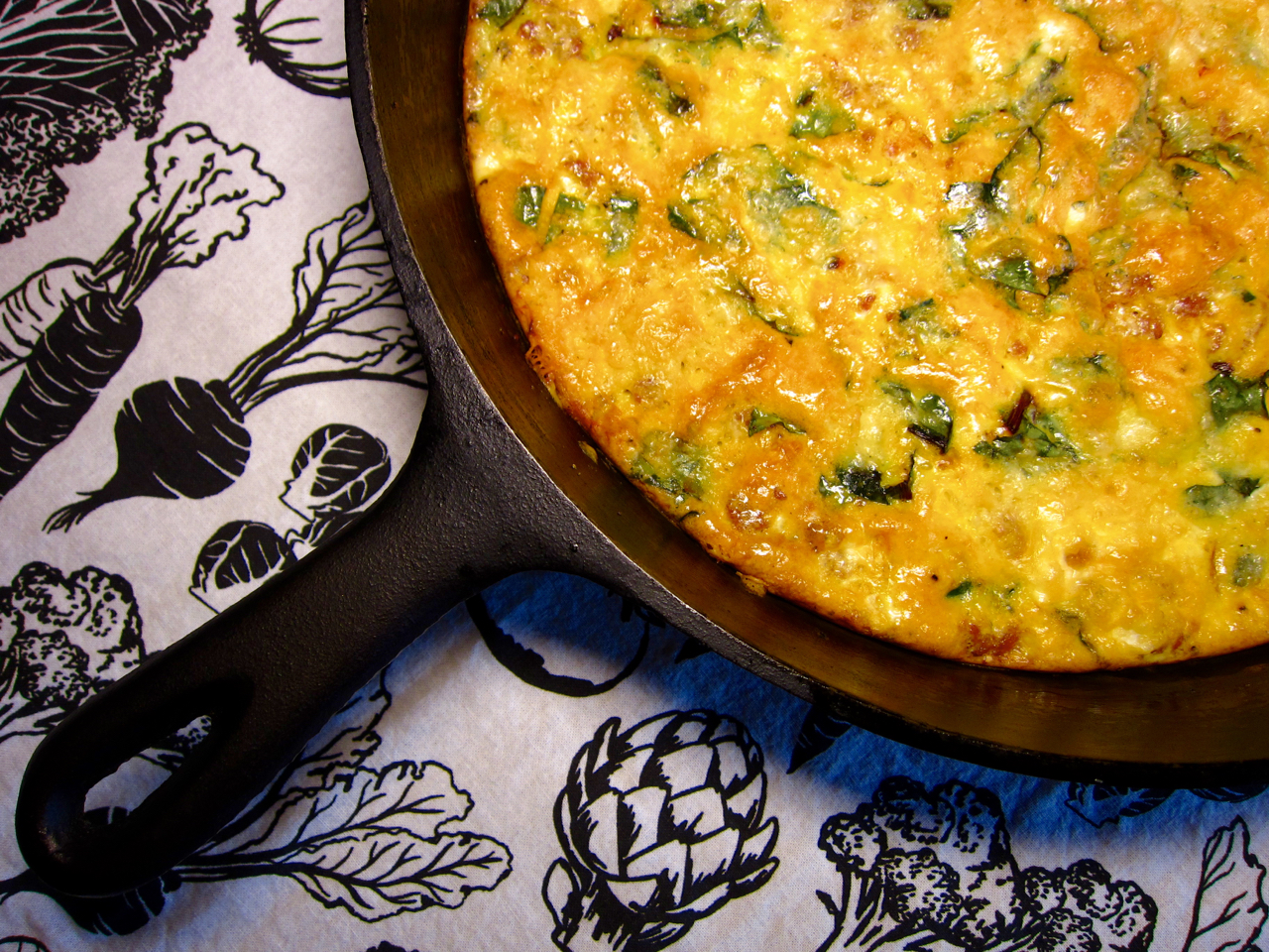One More Taste Frittata with Sausage, White Cheddar and Beet Greens