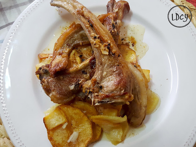 Chuletas De Cordero Al Ajo Cabañil/ Lamb Chops With &#8220;ajo Cabañil&#8221;(garlic Crushed With Vinegar, Salt And Water) 
