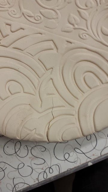 Crack in slab made roller pattern ceramic bowl.