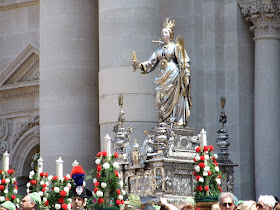 A silver statue of Santa Lucia is borne through the  streets of Syracuse on December 13 each year