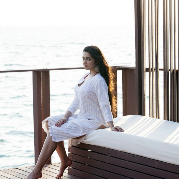 Charmi Kaur latest hot beach photo shoot stills