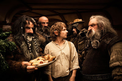The vagabond dwarves feast unwelcome at Bilbo's hobbit hole, Martin Freeman as Bilbo Baggins, directed by Peter Jackson