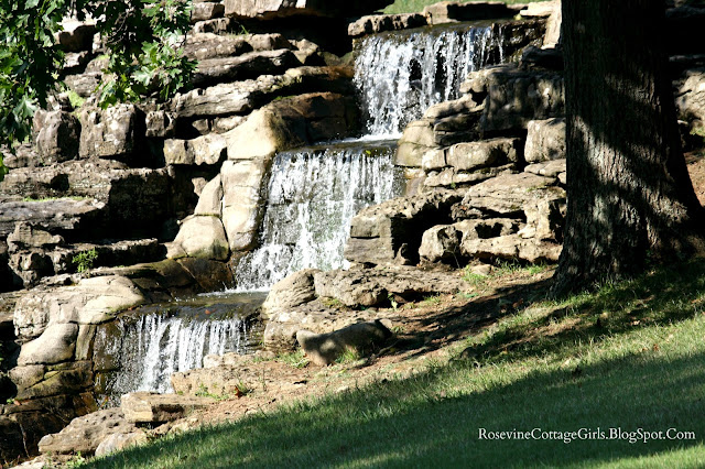 Stone waterfall terraced with cascading water at Cheekwood Botanical Garden