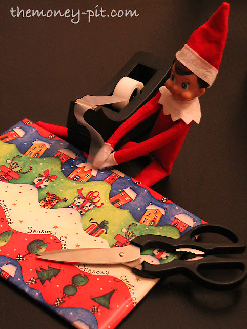 Elfie caught wrapping some last minute gifts: