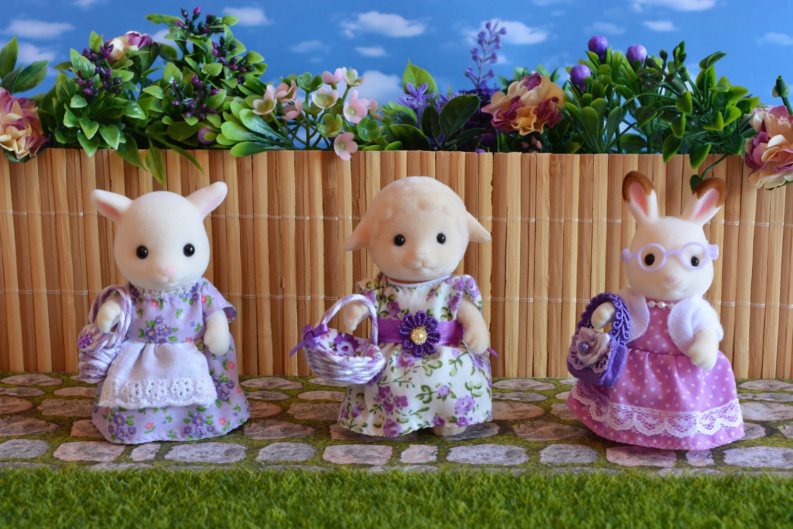 3 Calico Critter moms with a DIY purses and baskets.