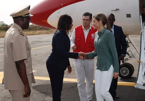 Queen Letizia wore Hugo Boss trousers, Hugo Boss blouse and Adolfo Dominguez shoes winter collection