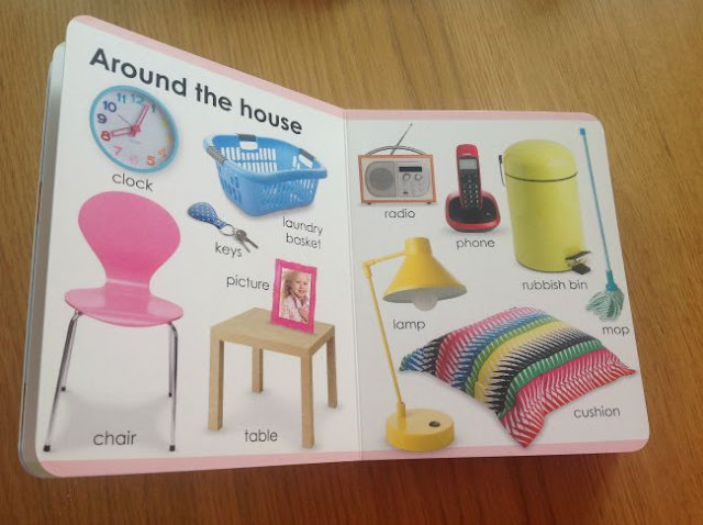 inside of book around the house with pictures of a chair, table etc